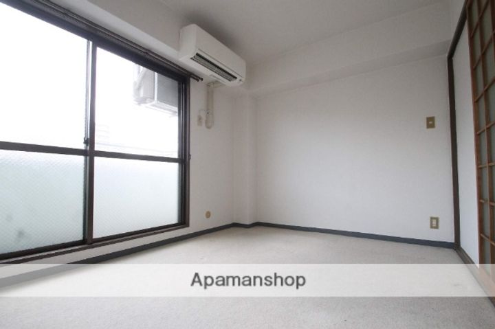 シャトー錦州201の居間