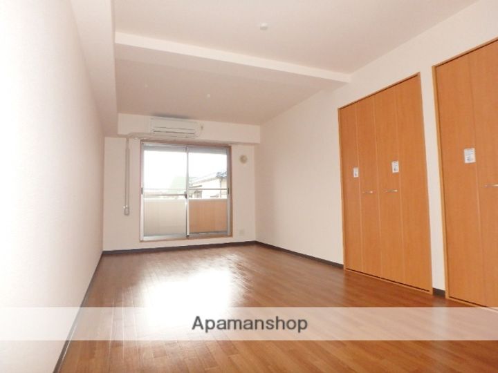 大阪府枚方市津田駅前1丁目の賃貸マンションの居間