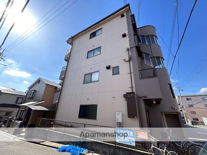 大阪府寝屋川市香里西之町の賃貸マンションの外観