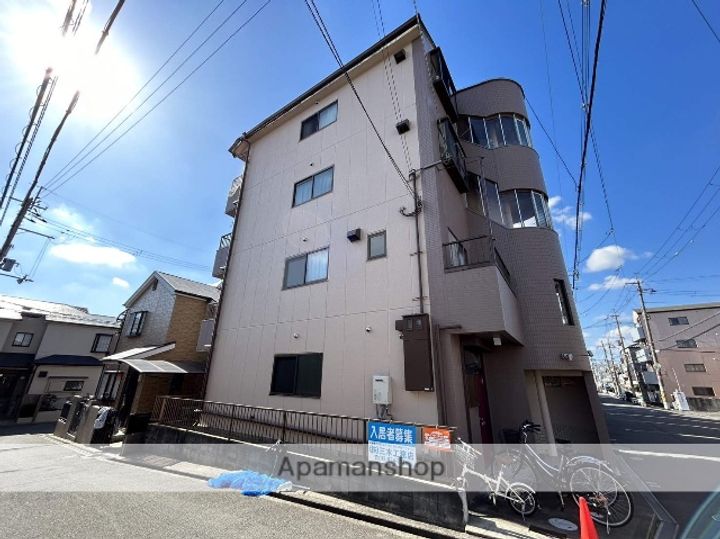 大阪府寝屋川市香里西之町の賃貸マンションの外観