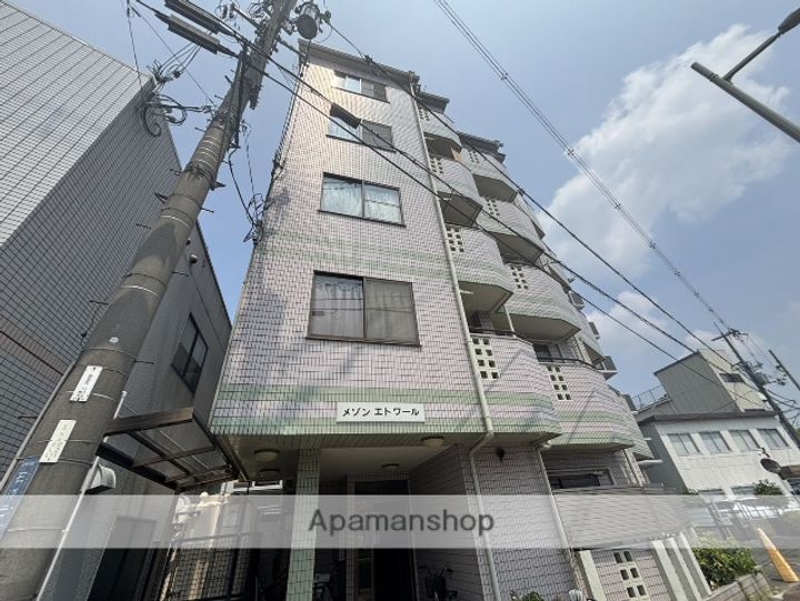 大阪府寝屋川市石津元町の賃貸マンションの外観