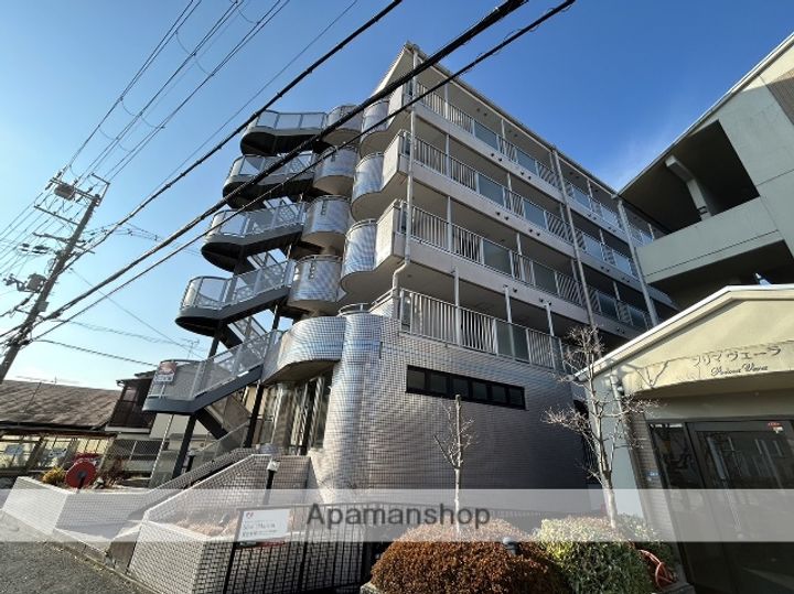 大阪府寝屋川市高宮新町の賃貸マンションの外観
