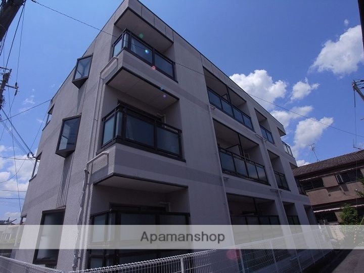 大阪府四條畷市岡山1丁目の賃貸マンションの外観