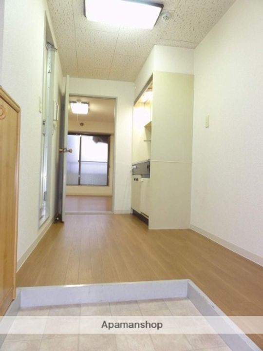 イクロスアメニティ野崎の玄関