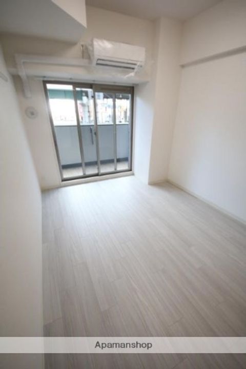 プレサンスOSAKA DOMECITYクロスティの居間