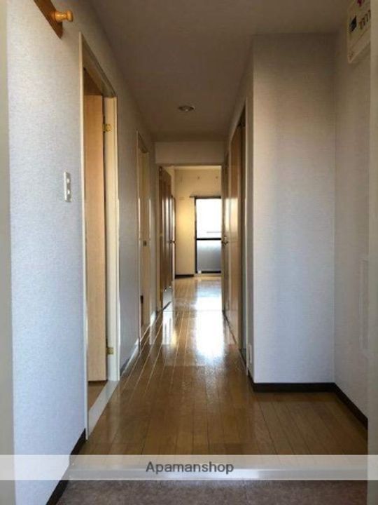 KMコートあびこの玄関