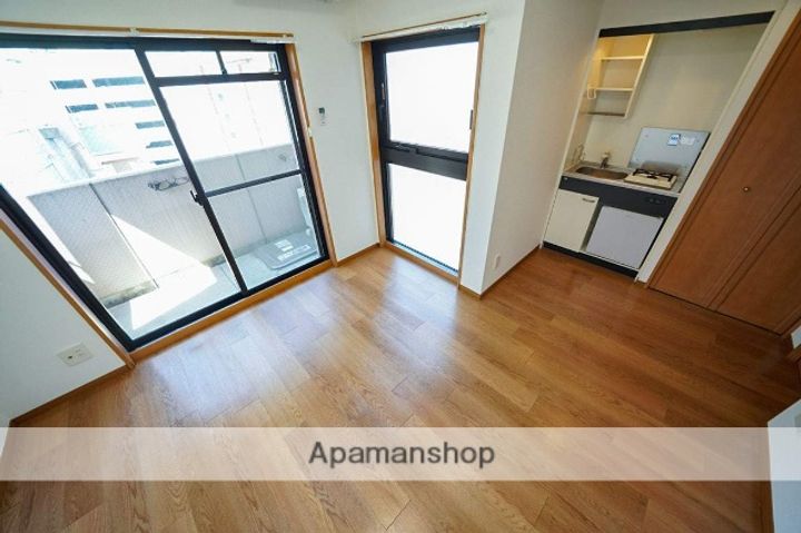 大阪府大阪市北区兎我野町の賃貸マンションの居間