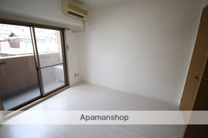 大阪府大阪市淀川区木川東3丁目の賃貸マンションの居間