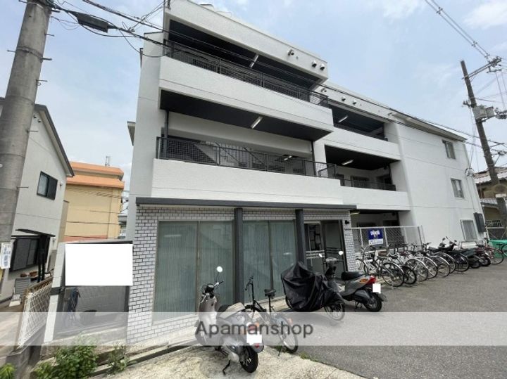 大阪府寝屋川市成田西町の賃貸マンションの外観
