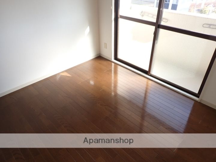 大阪府守口市滝井西町2丁目の賃貸マンションの居間