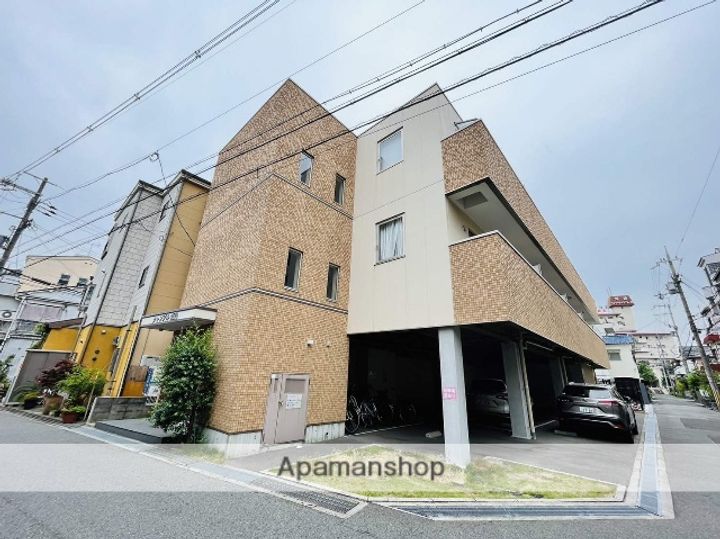 大阪府寝屋川市萱島信和町の賃貸マンションの外観