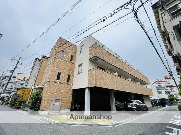 大阪府寝屋川市萱島信和町の賃貸マンションの外観