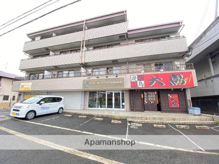 大阪府交野市私部西2丁目の賃貸マンションの外観