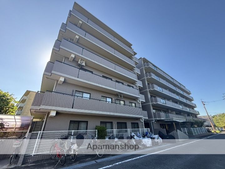 大阪府交野市藤が尾2丁目の賃貸マンションの外観