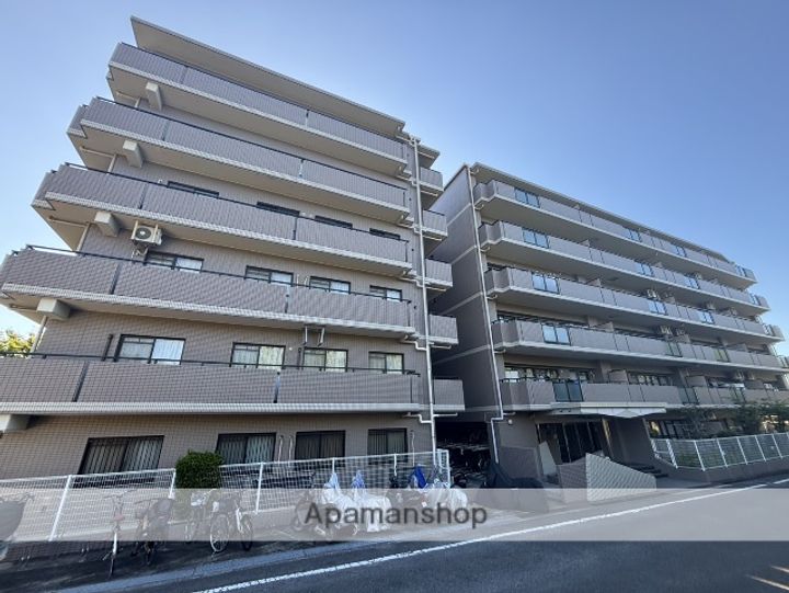 大阪府交野市藤が尾2丁目の賃貸マンションの外観