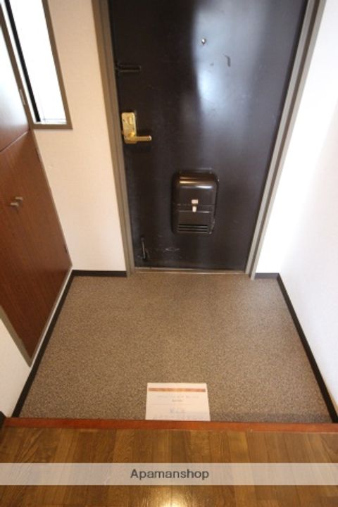 シュロス五月山Ⅲの玄関