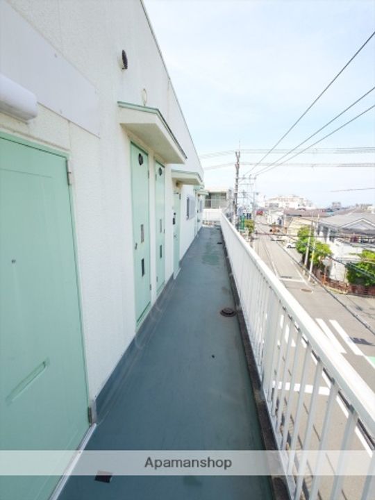 グリーンハイツ根来302の玄関