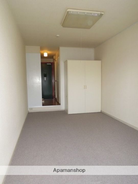 クリスタ久米田207の居間