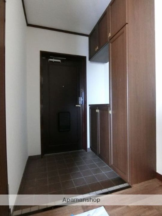 大阪府堺市北区百舌鳥本町1丁の賃貸マンションの玄関