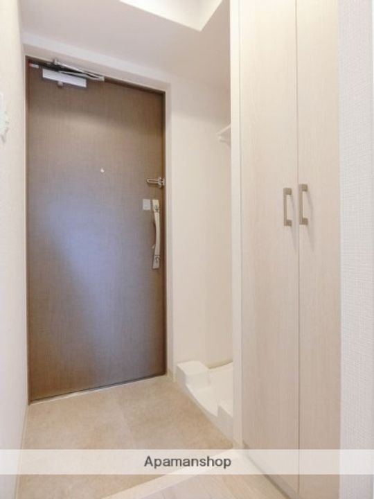 フォーリアライズ北三国ヶ丘504の玄関