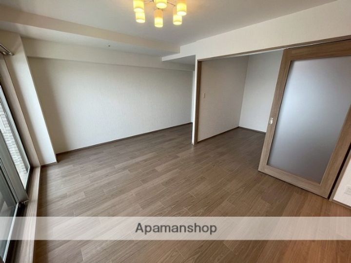 プレジオ永和ASIAN1106の居間