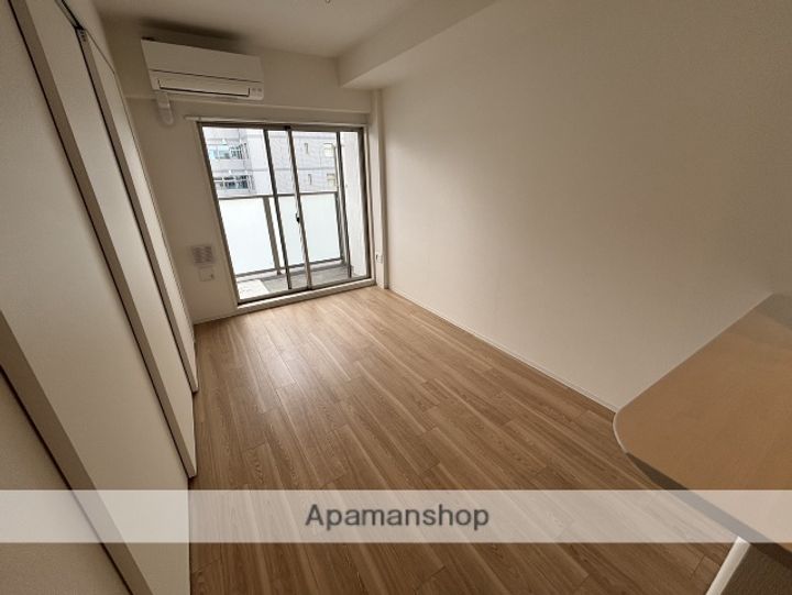 大阪府大阪市淀川区西宮原1丁目の賃貸マンションの居間