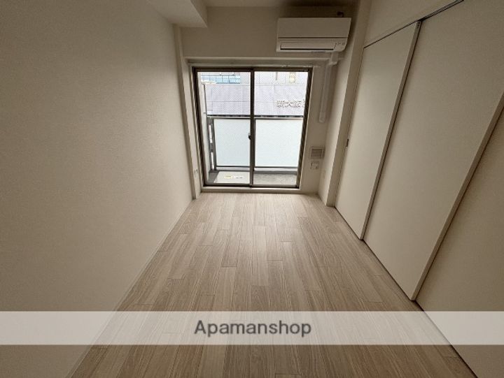 大阪府大阪市淀川区西宮原1丁目の賃貸マンションの居間