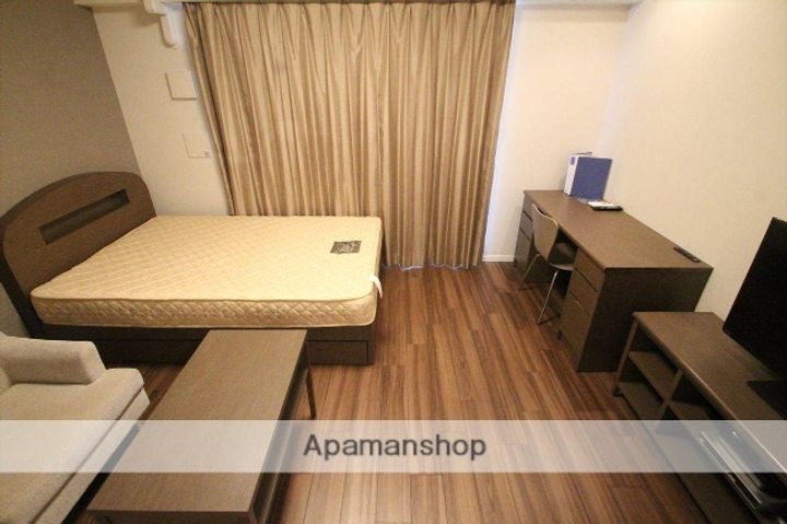 大阪府吹田市江坂町1丁目の賃貸マンションの居間