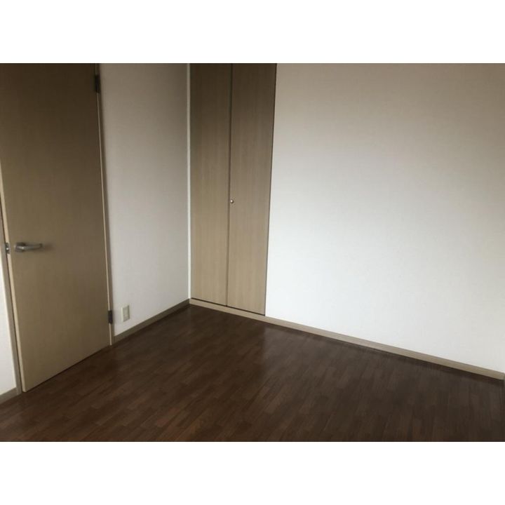 アップウェル八木203号室の居間