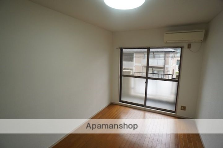 奈良県奈良市西大寺北町3丁目の賃貸マンションの居間