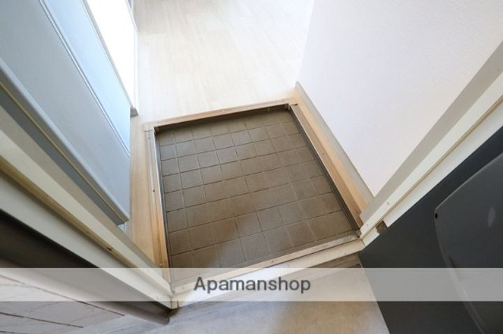 アルファ生駒の玄関