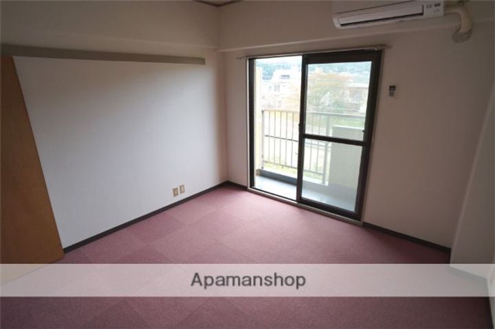 奈良県生駒市中菜畑2丁目(マンション)の賃貸物件の居間