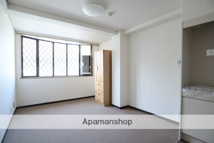 奈良県生駒市元町1丁目の賃貸マンションの居間