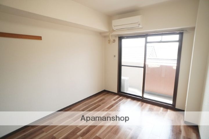 奈良県奈良市富雄北2丁目の賃貸マンションの居間