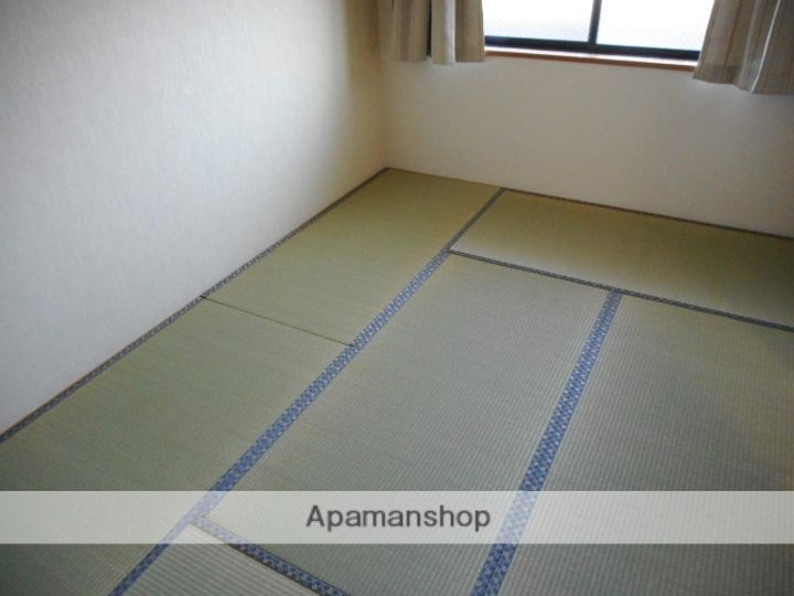 和歌山県田辺市高雄3丁目の賃貸マンション303の居間