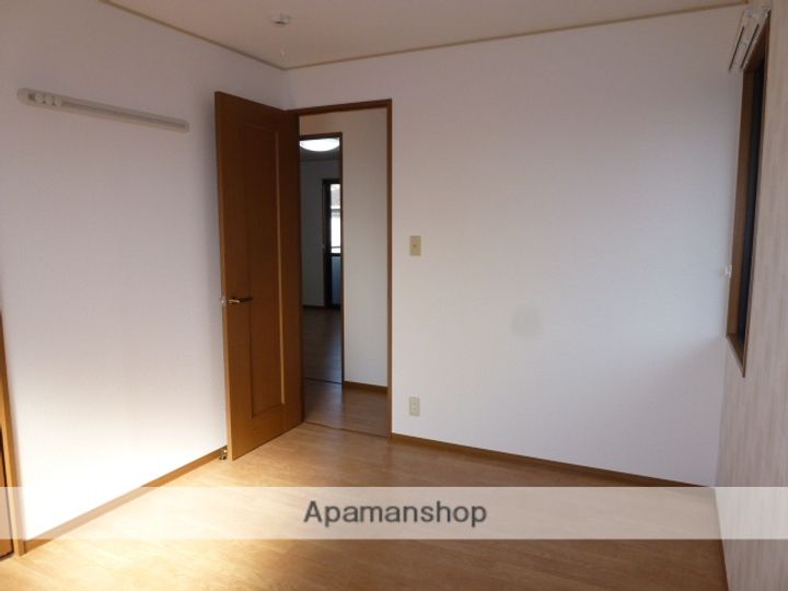 鳥取県米子市東福原7丁目の賃貸アパート202の居間