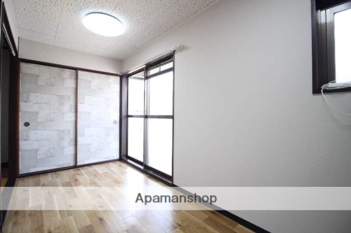 ホワイトメゾンブランセ207の居間