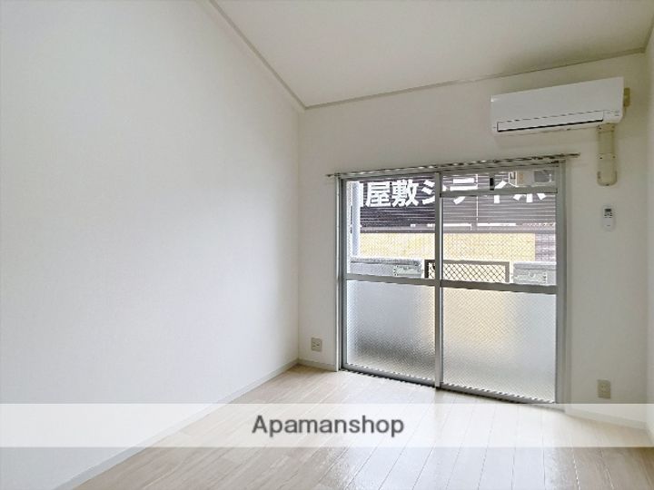 岡山県岡山市中区門田屋敷1丁目の賃貸マンションの居間