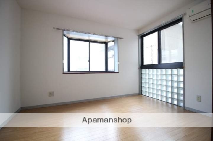 岡山県岡山市北区青江1丁目の賃貸マンションの居間