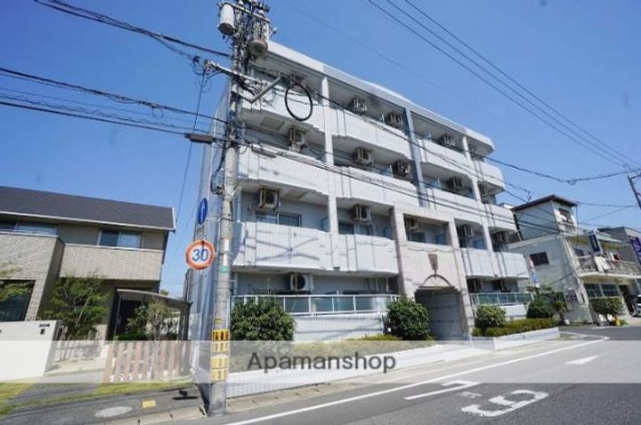アルファ西古松402の外観