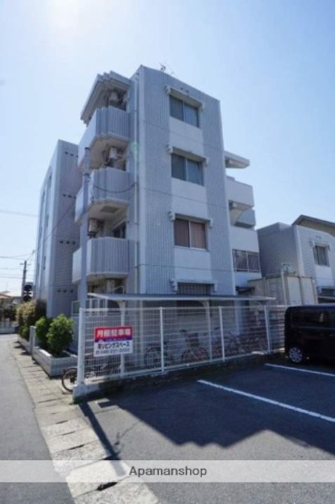 アルファ西古松402の外観