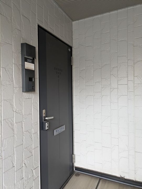 レイモンドサンヴィレッジD棟202号室の外観