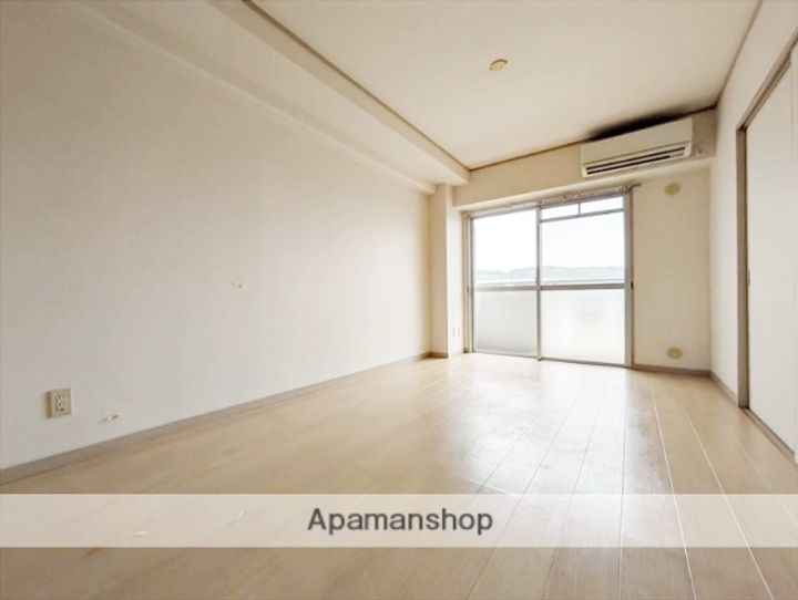 岡山県倉敷市白楽町の賃貸マンションの居間