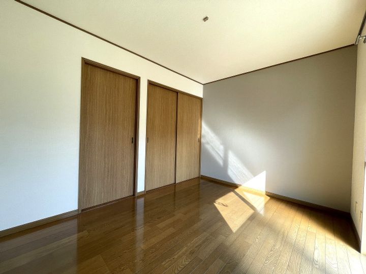 広島県広島市安佐北区三入1丁目の賃貸アパートの居間