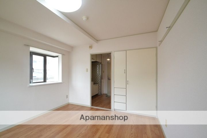 広島県広島市西区三篠北町の賃貸マンションの居間