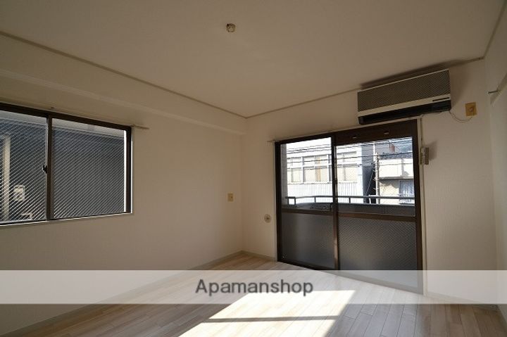 広島県広島市西区三篠北町の賃貸マンションの居間