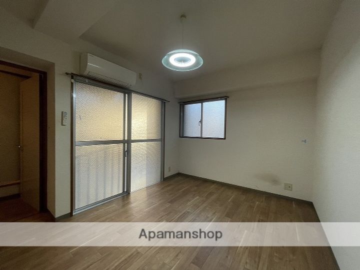 広島県広島市西区三篠町3丁目の賃貸マンションの居間