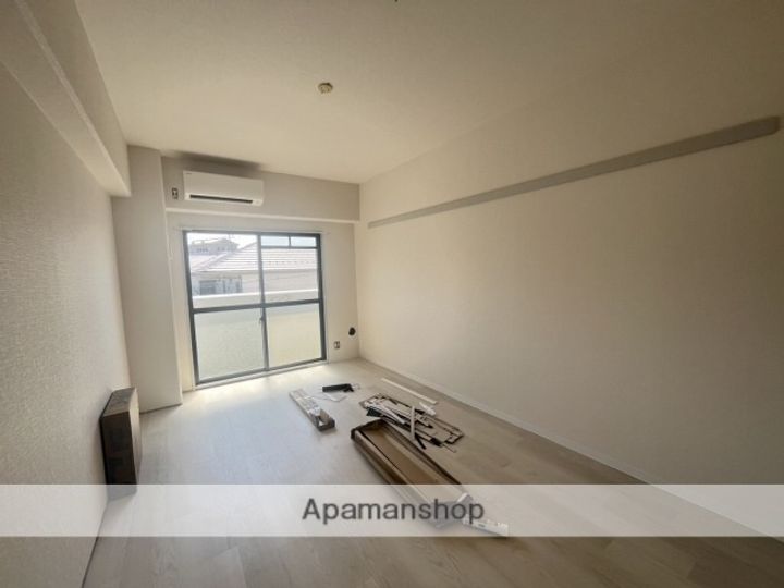 広島県広島市安佐南区大町東2丁目の賃貸マンションの居間