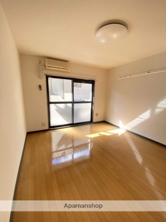広島県広島市西区南観音2丁目の賃貸マンションの居間