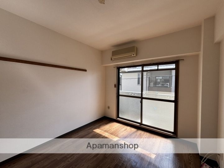 広島県広島市安佐南区西原4丁目の賃貸マンションの居間